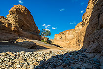 pebbles & rock formation in canyon
