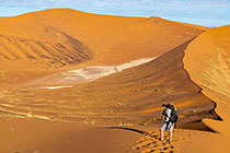 Paul taking photo on sand dune