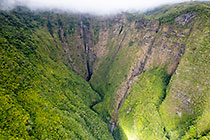 waterfall in green ravine