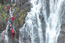 adrenaline junkies abseiling waterfalls