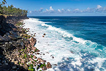 waves breaking along seashore