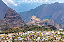 town on plateau & mountain peak