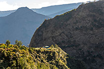 house on plateau & gorge & mountains