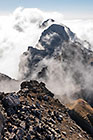 moonscape mountain peaks under clouds