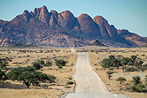 road to massif granite monolith Spitzkoppe mountain