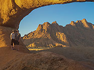 Sandy & Don under natural arch & Spitzkoppe mountain