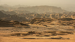 arid hills at sunset