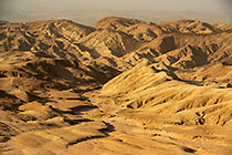 arid hills at sunset