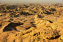 arid hills at sunset