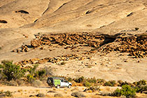 ranger camper driving near granite monolith mountain