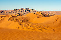 sand dunes & mountain at sunrise