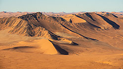 sand dunes at sunrise