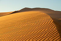 sand dunes at sunset