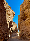 Don & Sandy & rock formation in canyon