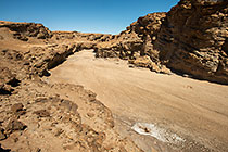 sandy riverbed in canyon