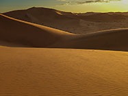 sand dunes at sunset 