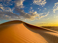 sand dunes at sunset 