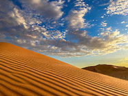 sand dunes at sunset 