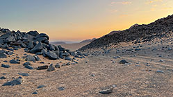 rocky hill at dusk