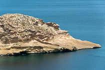 rocky island in sea