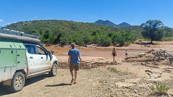 Jojo, Marc, Marie & Paul studying river crossing