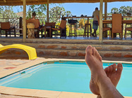 Paul's feet near swimming pool