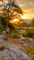 Marie walking at sunset