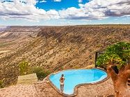 woman next to swimming pool