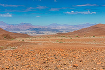 rocky valley under clouds
