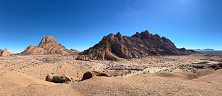 pano - massive granite hills in plain