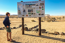 Julien reading welwitschia sign board