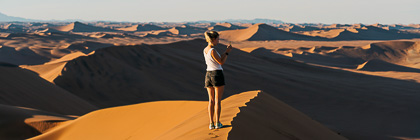 Manon on top of sand dune