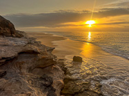ocean & seashore at sunset
