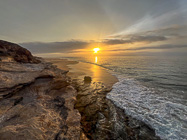 ocean & seashore at sunset