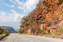 road through sanstone cliffs