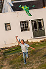 Enya playing with kite at village hotel