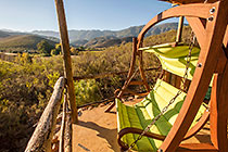 long swing chair & view on mountains from lapa