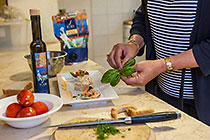 Gina preparing food in kitchen